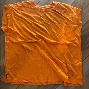 Orange shirt no tags Willing to accept offers!!! ( don’t know where it’s from)